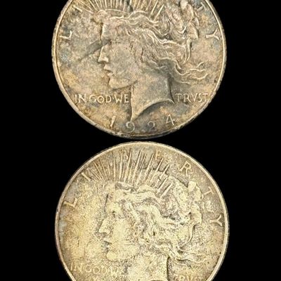 Sale Photo Thumbnail #603: Includes a 1922-S Peace dollar, and a 1924-S Peace dollar. Total of two ungraded coins. The silver content is 90%. [PM]