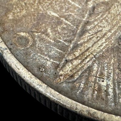 Sale Photo Thumbnail #605: Includes a 1922-S Peace dollar, and a 1924-S Peace dollar. Total of two ungraded coins. The silver content is 90%. [PM]