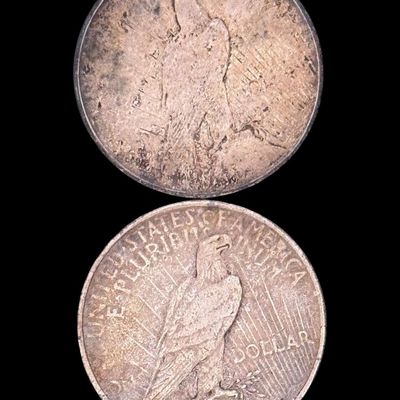 Sale Photo Thumbnail #604: Includes a 1922-S Peace dollar, and a 1924-S Peace dollar. Total of two ungraded coins. The silver content is 90%. [PM]