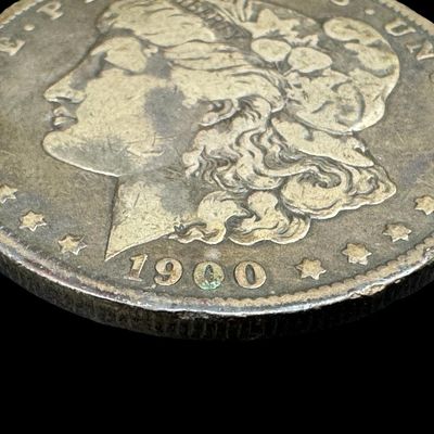 Sale Photo Thumbnail #615: This 1900-O Morgan is not graded. The silver content is 90%. [PM]