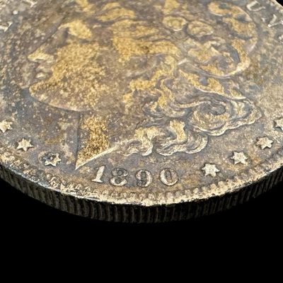 Sale Photo Thumbnail #622: This 1890-O Morgan is not graded. The silver content is 90%. [PM]