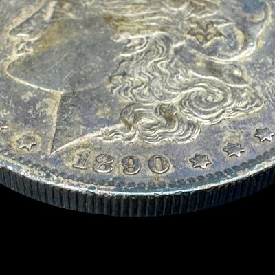 Sale Photo Thumbnail #626: This 1890-S Morgan is not graded. The silver content is 90%. [PM]