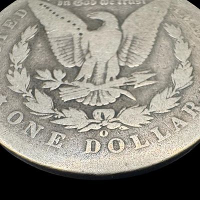 Sale Photo Thumbnail #667: This 1897-O Morgan is not graded. The silver content is 90%. [PM]