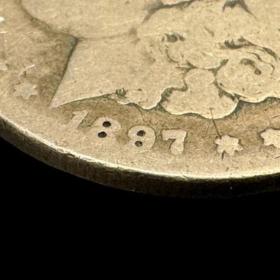 Sale Photo Thumbnail #668: This 1897-O Morgan is not graded. The silver content is 90%. [PM]