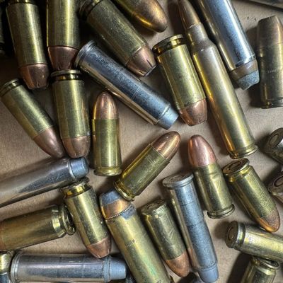 Sale Photo Thumbnail #699: Includes a wide variety of ammunition in the following calibers: .38 special, .44 mag, .30 cal, 5.56, and 9mm. Total of 100+ rounds. **NO SHIPPING ON AMMUNITION.** [GG]