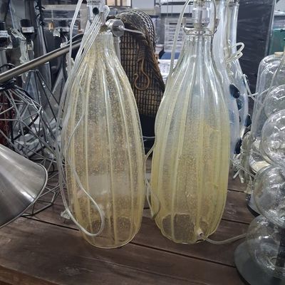Pair of Mid-Century Modern Murano Style Ribbed Glass Table Lamps with Gold Inclusions