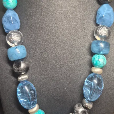 Sale Photo Thumbnail #160: Very Fashionable Jewels ~ 2 multi stone Blue Necklaces / Cuff Bracelet / Earrings  [4pcs]
> Charming Charlie double strand bead + glass beads
> chunky multi stone choker 
> hinged enamel bracelet 
> pair of pierce rhinestone earrings in blue