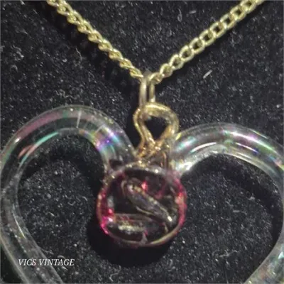 Sale Photo Thumbnail #316: GLASS HEART necklace & matching ruby vintage earrings [VC]

> custom created "heart" necklace on Gold tone chain

> ruby earrings set in gold filigree setting

> both uniques and excellent condition