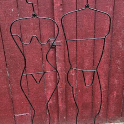 6 foot tall wrought iron figures (1 male/1 female)
