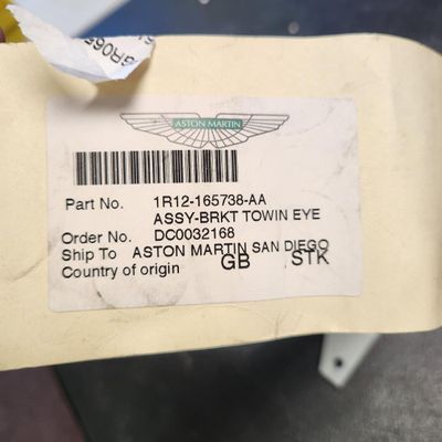 Sale Photo Thumbnail #22: Part Number 1R12-165738-AA Assy-Brkt Towin Eye All parts are original OEM and New in Box. Please check the part number to make sure of proper fit for your vehicle.