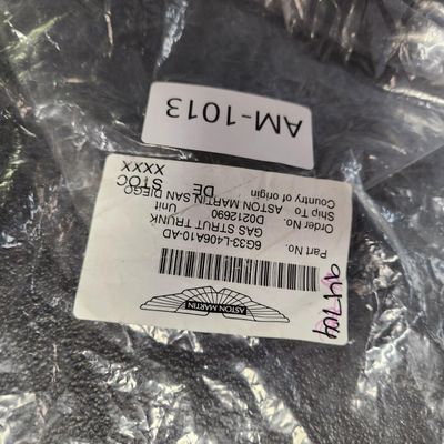 Sale Photo Thumbnail #46: Part Number 6G33-L406A10-AD Gas Strut For Trunk  All parts are original OEM and New in Box. Please check the part number to make sure of proper fit for your vehicle.