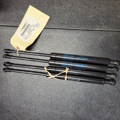 Sale Photo Thumbnail #49: Part Number AD43-406A10-AB Gas Strut For Trunk  All parts are original OEM and New in Box. Please check the part number to make sure of proper fit for your vehicle.