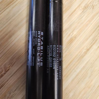 Sale Photo Thumbnail #54: Part Number AD43-F23505-AB Rear Left&Right Hand Door Gas Strut All parts are original OEM and New in Box. Please check the part number to make sure of proper fit for your vehicle.