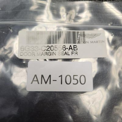 Sale Photo Thumbnail #135: Part Number 6G33-C20556-AB Door Margin Seal All parts are original OEM and New in Box. Please check the part number to make sure of proper fit for your vehicle.