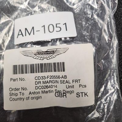 Sale Photo Thumbnail #137: Part Number CD33-F20556-AB Front Right Door Margin Weather Strip Seal All parts are original OEM and New in Box. Please check the part number to make sure of proper fit for your vehicle.