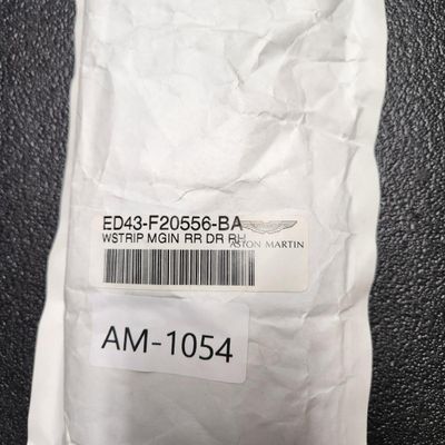 Sale Photo Thumbnail #144: Part Number ED43-F20556-BA Rear Right Door Weather Strip Margin Seal  All parts are original OEM and New in Box. Please check the part number to make sure of proper fit for your vehicle.