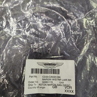 Sale Photo Thumbnail #157: Part Number CD33-C25324-BA Margin Wing Strip Lower Right Rear All parts are original OEM and New in Box. Please check the part number to make sure of proper fit for your vehicle.