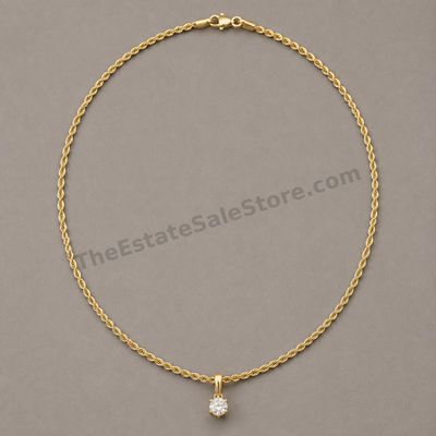 Sale Photo Thumbnail #17: Fine 18-inch yellow-gold rope chain with spring-ring clasp and a removable round solitaire diamond-style pendant. Chain and pendant are both marked 14K; estimated combined gross weight 3.9 grams. The pendant stone is approximately 5 mm in diameter. Good w