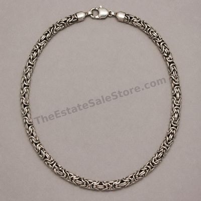 Sale Photo Thumbnail #23: Bold sterling silver necklace constructed with tightly woven Byzantine-style links and finished with a large lobster clasp. Approximate wearable length 20 inches and estimated gross weight 48.5 grams. Marked 925 near the clasp. Light overall patina with n