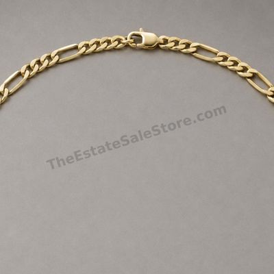 Sale Photo Thumbnail #39: Classic 22-inch yellow-gold Figaro-link chain with lobster clasp. Marked 14K; approximate width 4.5 mm and estimated gross weight 18.6 grams. Links show light scuffing and small areas of softened polish from previous wear, while the clasp closes securely.