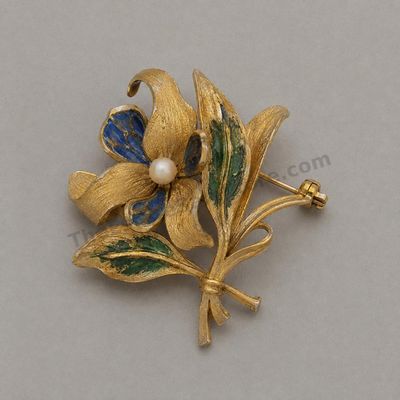 Sale Photo Thumbnail #75: Vintage yellow-gold floral brooch formed as textured leaves and petals with blue and green enamel-style accents and a small pearl-style center. Marked 750; approximate width 2 inches and estimated gross weight 11.8 grams. Minor enamel chips and patina are