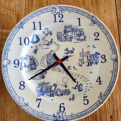 WINNIE-THE-POOH BLUE AND WHITE CERAMIC WALL CLOCK