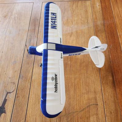 HOBBYZONE BLUE AND WHITE RC AIRPLANE