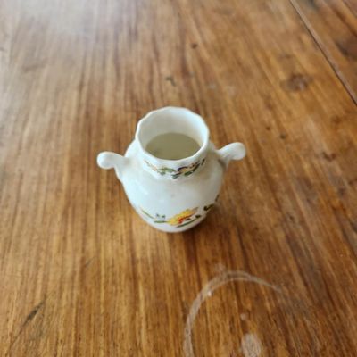 MINIATURE FLORAL DOUBLE-HANDLED PORCELAIN VASE