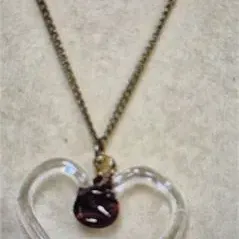 Sale Photo Thumbnail #363: GLASS HEART necklace & matching ruby vintage earrings [VC]

> custom created "heart" necklace on Gold tone chain

> ruby earrings set in gold filigree setting

> both uniques and excellent condition