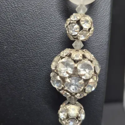 Sale Photo Thumbnail #218: Vintage creamy glass beaded Necklace & Large glass bead Necklace & Earrings
> 2 fashionable necklaces and Earring set
> multi strand frosted glass beads, w/ 4 strand clasp
> large frosted necklace has 3 rhinestone beads random spaced
> earrings are mop sh
