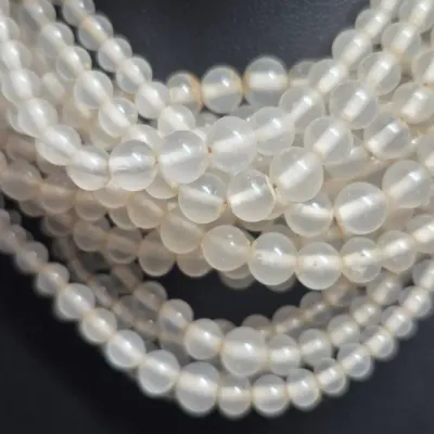 Sale Photo Thumbnail #215: Vintage creamy glass beaded Necklace & Large glass bead Necklace & Earrings
> 2 fashionable necklaces and Earring set
> multi strand frosted glass beads, w/ 4 strand clasp
> large frosted necklace has 3 rhinestone beads random spaced
> earrings are mop sh