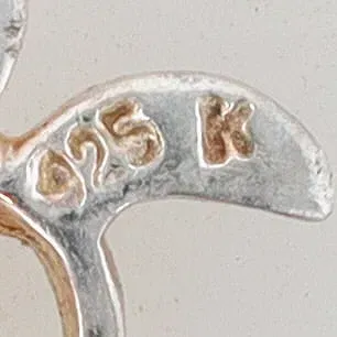 Sale Photo Thumbnail #258: Signed 'K' Sterling Turtle on sterling curb chain 0.2g & pair

sterling "X" files stud Earring