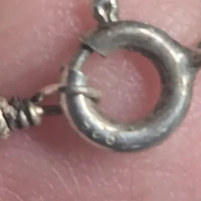 Sale Photo Thumbnail #260: Signed 'K' Sterling Turtle on sterling curb chain 0.2g & pair

sterling "X" files stud Earring