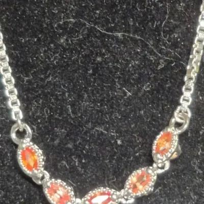 Sale Photo Thumbnail #321: Vintage double Star Pendant in Italy 925 curb chain & Rhinestone Bracelet tested sterling
> Star pendant and chain .....16" long
> Bracelet is 7.25" long
both brilliant and excl. condition