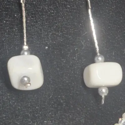 Sale Photo Thumbnail #341: Vintage Freshwater Pearls w/ MOP teardrops & White Elephant dangle Earrings set
Sterling mark is on the "tongue" of the lobster claw clasp
Necklace is choker 13" length
