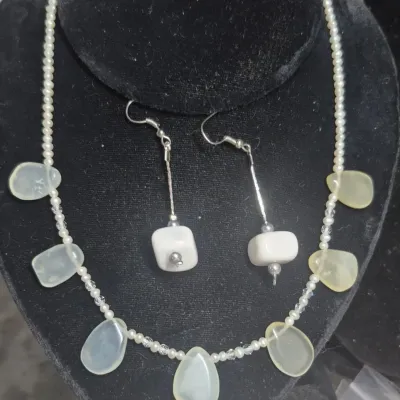 Sale Photo Thumbnail #340: Vintage Freshwater Pearls w/ MOP teardrops & White Elephant dangle Earrings set
Sterling mark is on the "tongue" of the lobster claw clasp
Necklace is choker 13" length