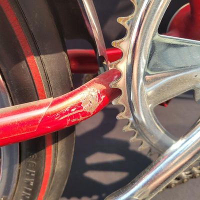 Sale Photo Thumbnail #38: Red Schwinn Sting-Ray Apple Krate with 5-speed Stik-Shift, springer front end, high-rise bars, red grips, tall sissy bar, striped banana seat, front drum-style hub and rear redline slik tire. Complete, well-presented example with normal vintage wear inclu