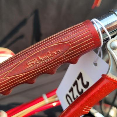Sale Photo Thumbnail #33: Red Schwinn Sting-Ray Apple Krate with 5-speed Stik-Shift, springer front end, high-rise bars, red grips, tall sissy bar, striped banana seat, front drum-style hub and rear redline slik tire. Complete, well-presented example with normal vintage wear inclu