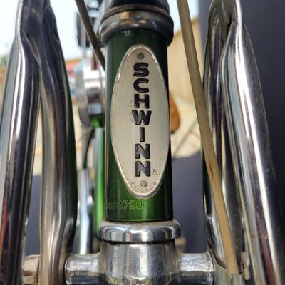 Sale Photo Thumbnail #53: Original Campus Green Schwinn Sting-Ray Pea Picker Krate with 5-speed Stik-Shift, springer fork, green banana seat and grips, tall sissy bar, Schwinn Sting-Ray speedometer/cyclometer and front lighting/reflector accessories. Also fitted with fun display a