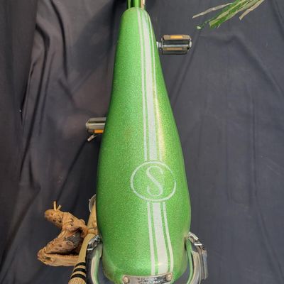 Sale Photo Thumbnail #50: Original Campus Green Schwinn Sting-Ray Pea Picker Krate with 5-speed Stik-Shift, springer fork, green banana seat and grips, tall sissy bar, Schwinn Sting-Ray speedometer/cyclometer and front lighting/reflector accessories. Also fitted with fun display a
