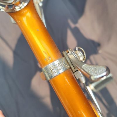 Sale Photo Thumbnail #67: Orange/coppertone Schwinn Collegiate men's multi-speed with full chrome fenders, rear carrier, chainguard, rear reflector, Schwinn grips and brown/cream Schwinn Approved saddle. Largely complete with a great period look. Shows typical age including paint 