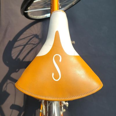 Sale Photo Thumbnail #62: Orange/coppertone Schwinn Collegiate men's multi-speed with full chrome fenders, rear carrier, chainguard, rear reflector, Schwinn grips and brown/cream Schwinn Approved saddle. Largely complete with a great period look. Shows typical age including paint 