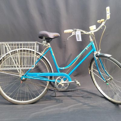 Sale Photo Thumbnail #70: Blue Schwinn Breeze women's 3-speed with full fenders, chainguard, oversized rear/side wire baskets, speedometer, bell, front reflector panel and rear reflector. The black saddle is a later replacement. Complete utility-style bicycle with plenty of vintag