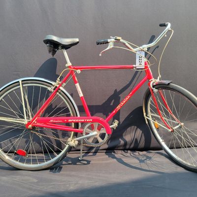 Sale Photo Thumbnail #84: Red Schwinn Speedster men's 3-speed with full fenders, chainguard, black Schwinn saddle and grips, rear reflector and kickstand. Complete, original-style vintage bicycle showing normal paint wear, chrome dulling, surface rust and aged tires. Good candidat