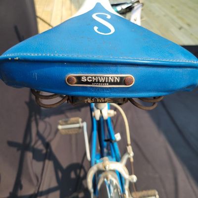 Sale Photo Thumbnail #152: Blue Schwinn Racer men's 3-speed with internal-gear hub, full fenders, blue/white saddle, blue grips and rear reflector. Complete vintage commuter showing normal saddle wear, chrome patina and age to the tires and hardware. Clean, classic Schwinn styling 