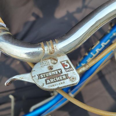 Sale Photo Thumbnail #183: Blue/teal Schwinn Fair Lady 3-speed with whitewall tires, full fenders, front rack, blue/white saddle, cream grips and bell. Complete and attractive vintage step-through bike with plenty of period style. Shows age to the saddle, chrome, spokes and tires a