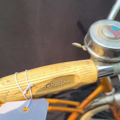 Sale Photo Thumbnail #199: Coppertone/orange Schwinn Corvette with whitewall tires, chrome front fender, missing rear fender, front rack, brown/cream saddle, bell and Corvette chainguard. Attractive survivor with a great original-style look and honest vintage patina. Shows normal p