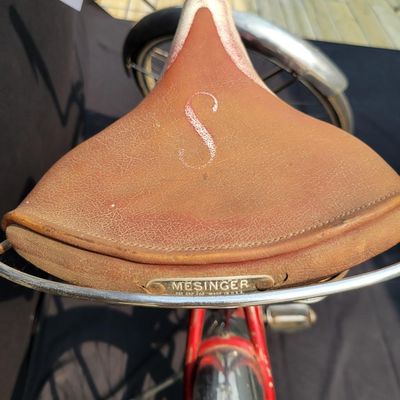 Sale Photo Thumbnail #230: Red Schwinn Corvette with chrome fenders, whitewall tires, brown saddle and Corvette chainguard. Complete vintage middleweight showing heavier cosmetic wear including faded/scratched graphics, paint chips and chrome oxidation. Good restoration candidate w
