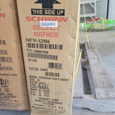 Sale Photo Thumbnail #314: Boxed Schwinn Grey Ghost Sting-Ray factory reproduction, model S2906, with gray finish noted on the Pacific Cycle carton. Modern reissue styled after the 1971 Grey Ghost, not an original vintage example. Bicycle remains boxed/unassembled; carton shows nor