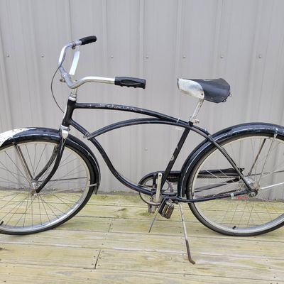 Sale Photo Thumbnail #331: Black Schwinn Speedster men's middleweight with classic cantilever frame, painted fenders, Speedster chainguard, chrome rims, kickstand, Schwinn-style grips and black/white saddle. Honest restoration-project condition with substantial paint loss, surface 